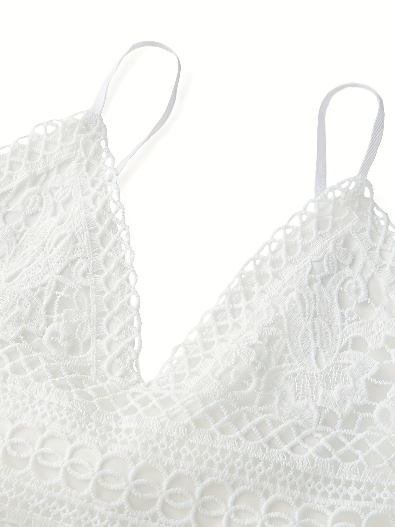 Vestido mini de tirantes finos de encaje blanco con elegante lazo en la espalda