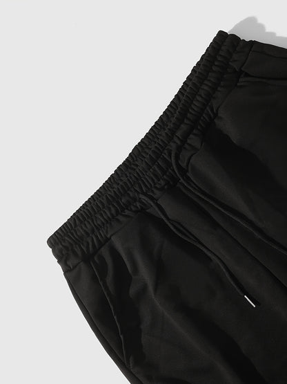 Men’s Black Flared Pants – Cross Print Streetwear Trousers with Red Stripe