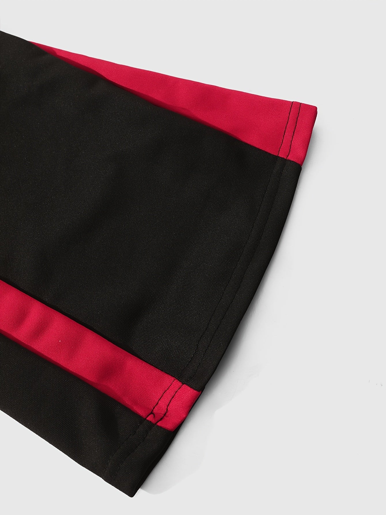 Men’s Black Flared Pants – Cross Print Streetwear Trousers with Red Stripe